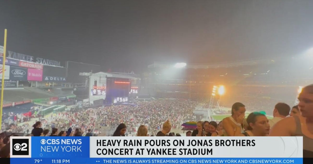 Heavy rain pours on Jonas Brothers concert at Yankee Stadium - CBS New York