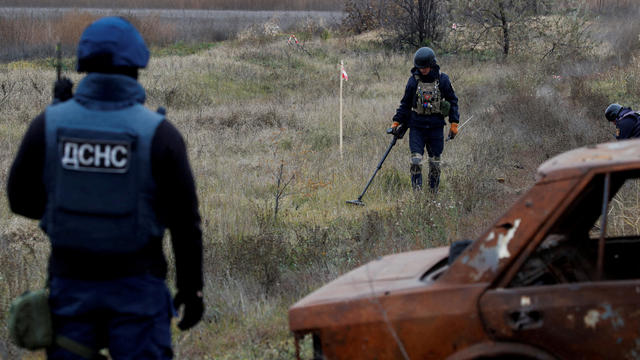 FILE PHOTO: Ukrainian mine experts scan for unexploded ordnance and landmines Kherson region 