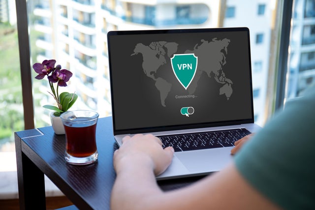 Man using VPN on laptop