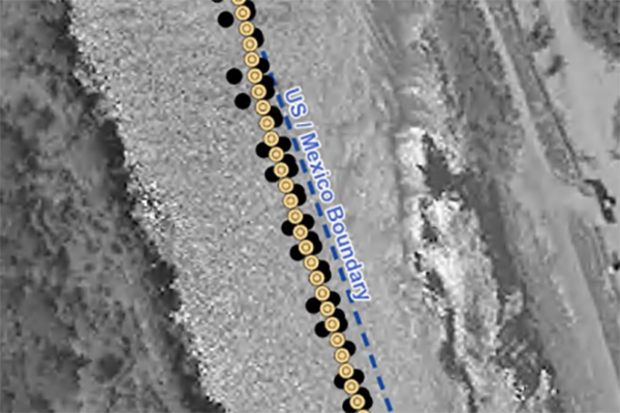 A satellite image by the International Water and Boundary Commission showing the location of controversial border barriers set up by the state of Texas in the Rio Grande. Black dots represent anchors for the buoys, while yellow dots signify the buoys them 