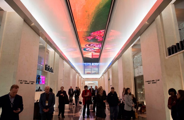 A digital screen is seen running the length of the museum lobby's ceiling during a media preview of the new Museum of the Bible
