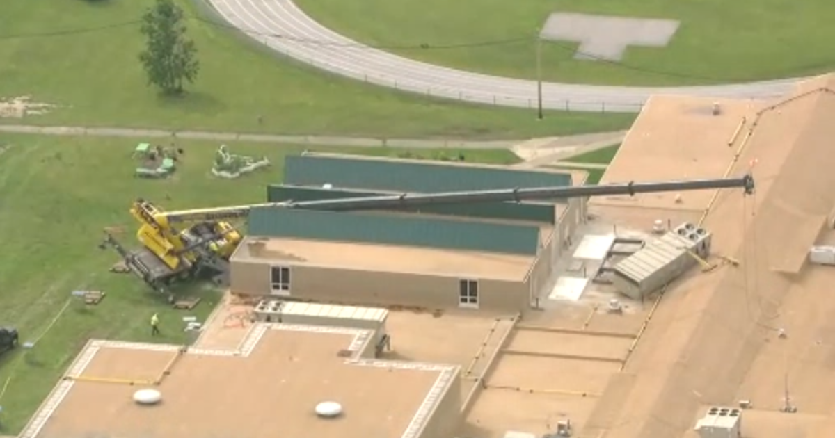 Crane collapses on middle school in Wayne