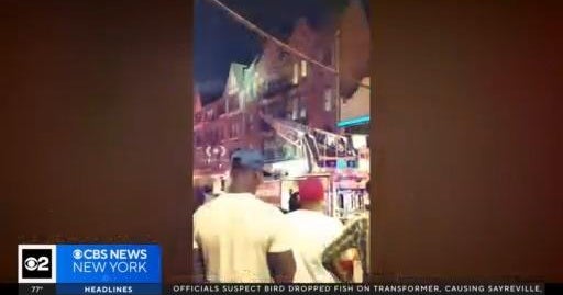 1 dead, baby among 4 injured in Queens apartment building fire - CBS ...