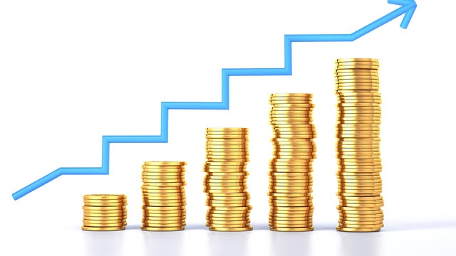 Gold coins and a growth chart, artwork 