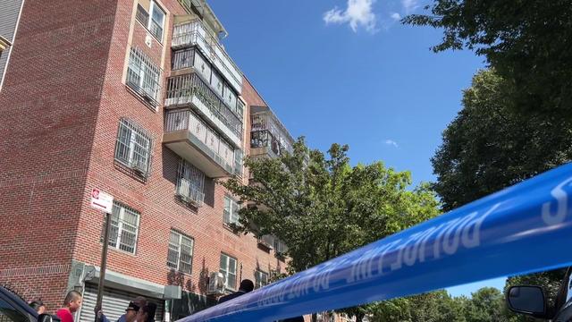 Crime scene tape blocks off an apartment building in Sunset Park 