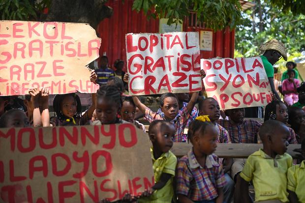 People demonstrate to demand the release of kidnapped New Hampshire nurse Alix Dorsainvil and her daughter in Port-au-Prince, Haiti, August 3, 2023. 