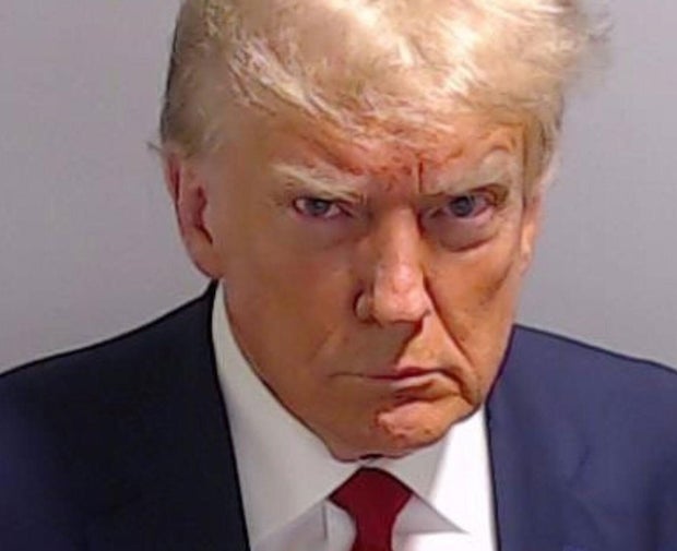 Former US President Donald Trump surrenders to Fulton County Jail in election case