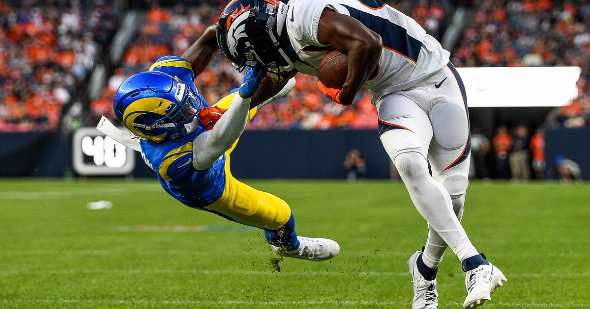 Tight end Albert Okwuegbunam of the Denver Broncos is tackled by News  Photo - Getty Images