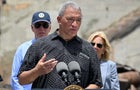 Maui Mayor Richard Bissen delivers remarks as President Biden listens during a visit to an area devastated by wildfires in Lahaina, Hawaii on August 21, 2023. 