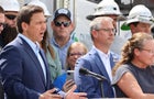 Florida Gov. Ron DeSantis speaks among Duke Energy electrical line technicians during a press conference at Duke Energy's Operations Center in Wildwood, Florida on Tuesday, Aug. 29, 2023. 