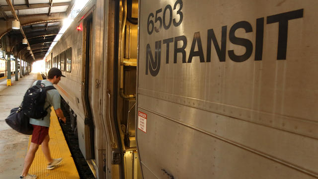 A person boards a NJ Transit train at the Hoboken Transit Terminal on September 1, 2023, in Hoboken, New Jersey. 