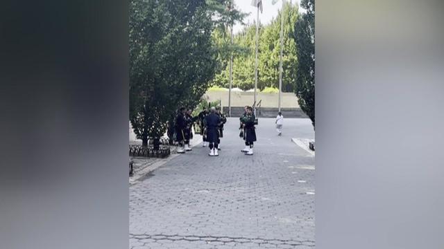 Bagpipers in uniform rehearsing in Battery Park City. 