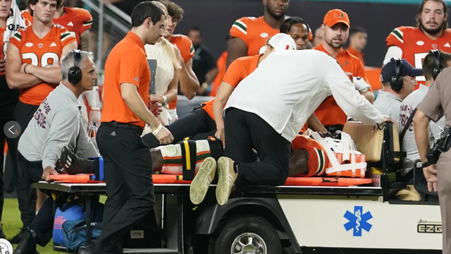 Kamren Kinchens carted off field
