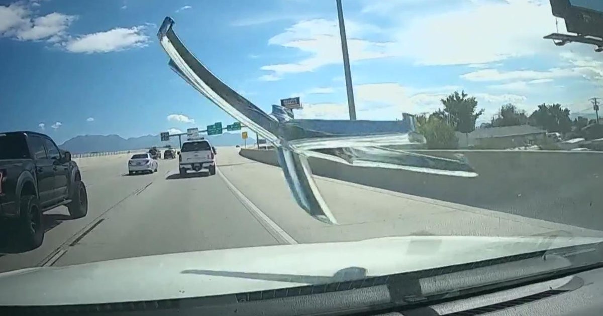 Video: Chair crashes into vehicle windshield on Utah freeway
