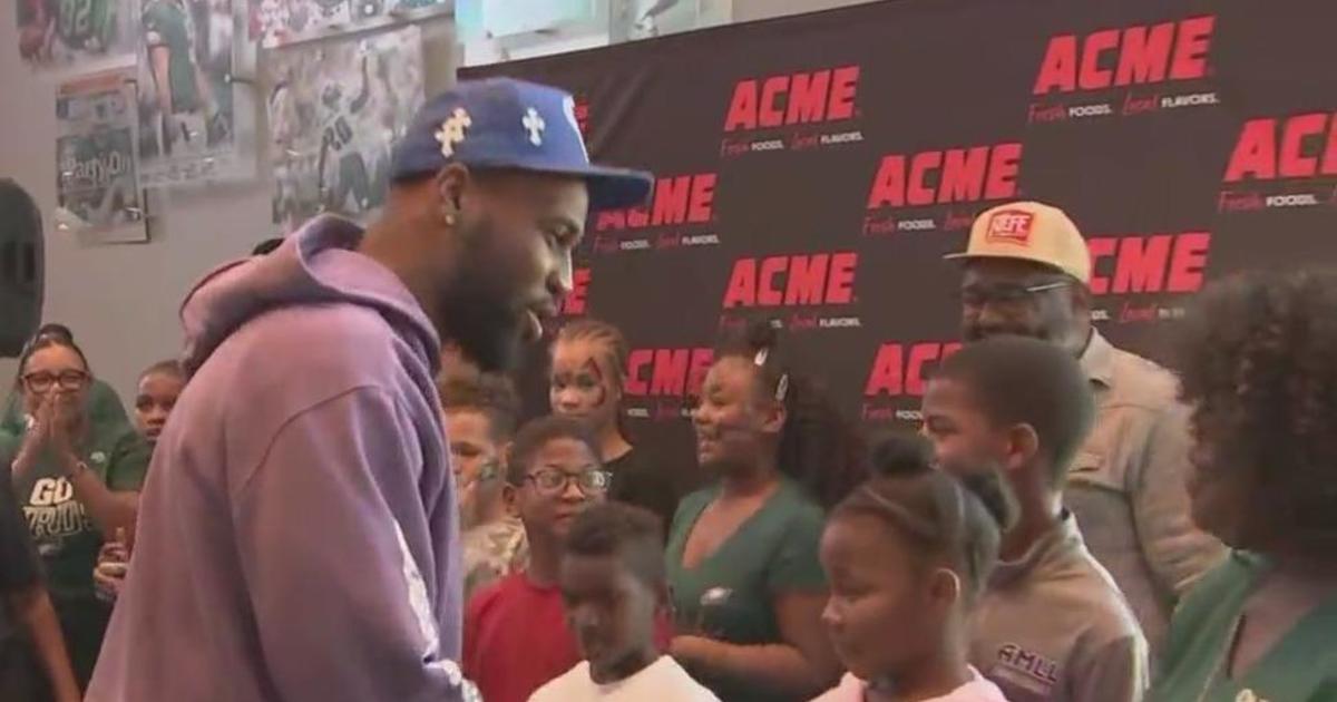 Haason Reddick gives gifts to foster children during his birthday party at the Linc