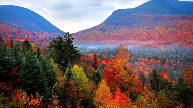 Aerial view at sunrise of Sheffield Falls in autumn, Ma. with Housatonic River running through town, Berkshire Mountains 