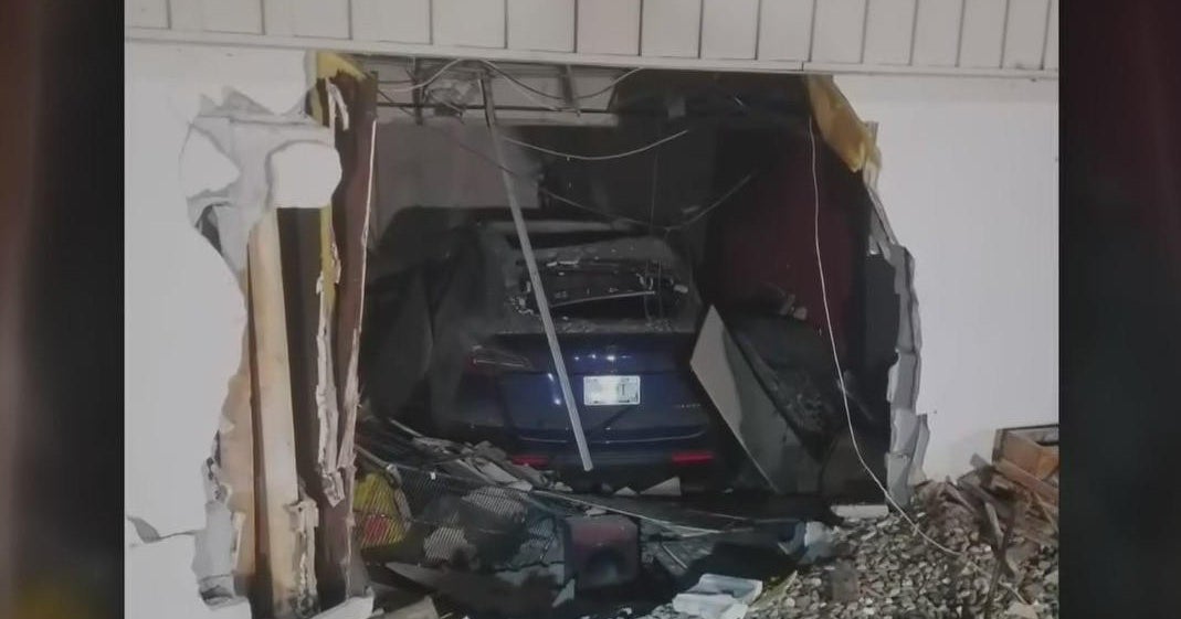 Tesla crashes into home in Northwest Indiana - CBS Chicago