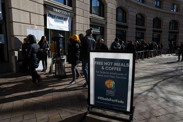 Federal workers line up outside chef and activist Jose Andres' World Central Kitchen to receive free meals and goods amid a partial government shutdown in Washington on Jan. 22, 2019. 