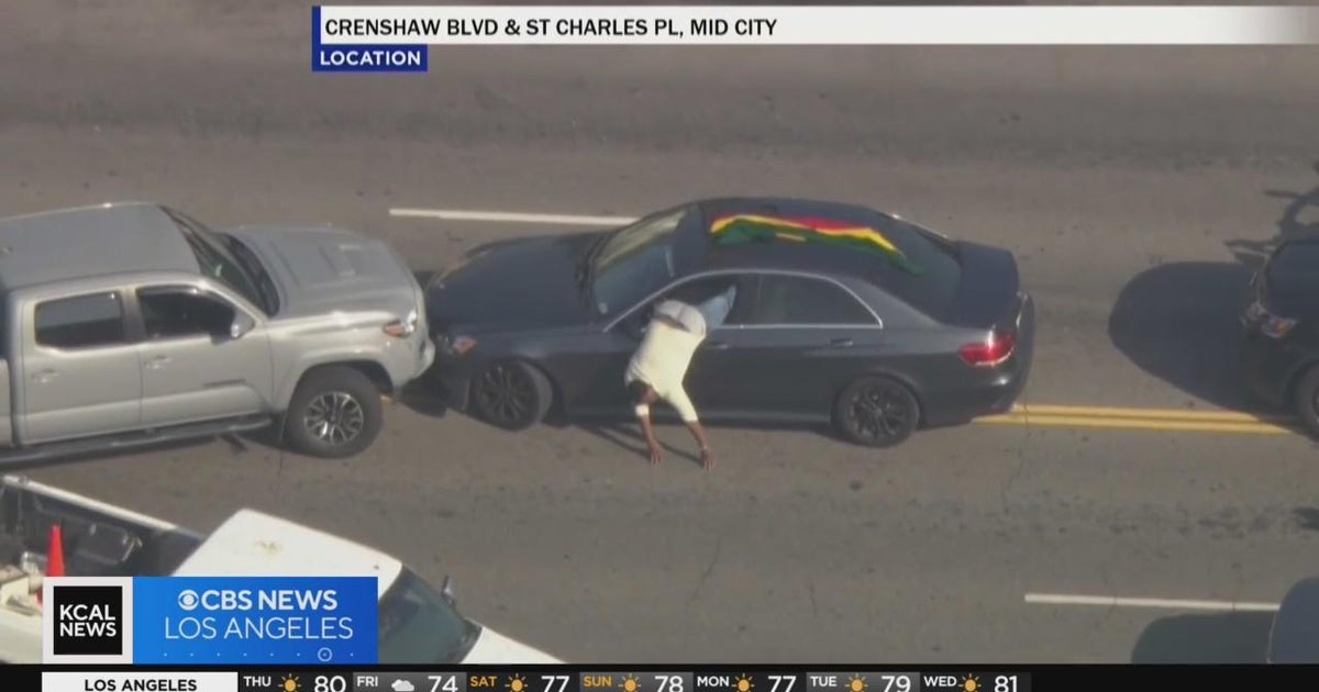 People react to a pursuit suspect doing a somersault before ...