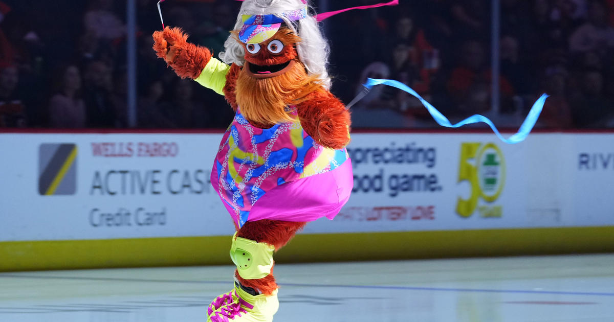 Gritty, the Philadelphia Flyers' mascot, left, and the Philly Phanatic  dance during a baseball game between the Philadelphia Phillies and the  Atlanta Braves, Saturday, Sept. 29, 2018, in Philadelphia. The Phillies won