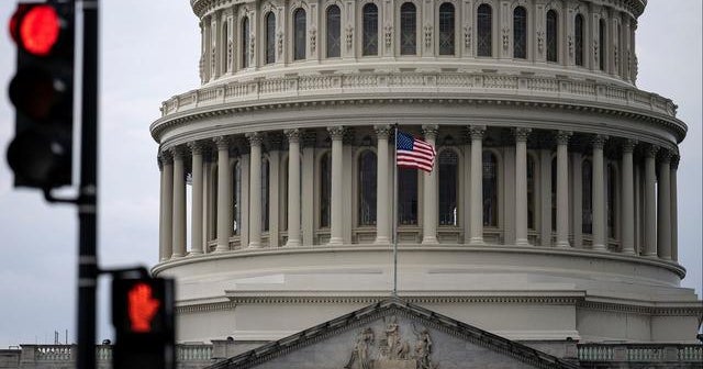 Moody's warns of credit downgrade if government shuts down; Biden and