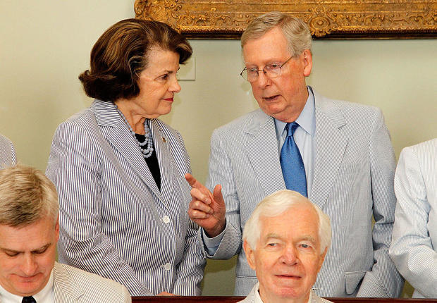 Sen. Dianne Feinstein and Senate Majority Leader Mitch McConnell celebrate National Seersucker Day at the U.S. Capitol on June 11, 2015, in Washington, D.C. 