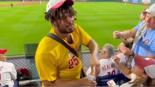 beer-vendor-reggie-duvalsaint-giving-out-free-beers-at-citizens-bank-park-phillies-marlins-game-2023.jpg 