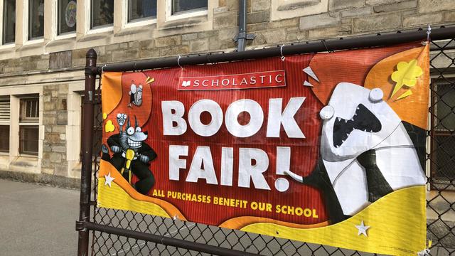 Scholastic Book Fair banner outside Catholic school, Queens, New York 