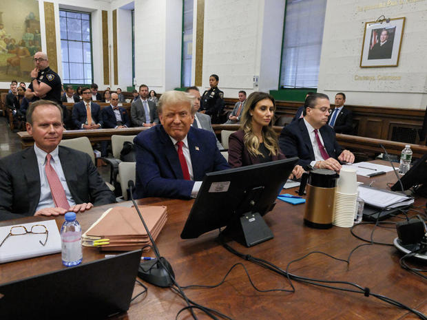 Former President Donald Trump, center, during a trial at New York State Supreme Court on Tuesday, Oct. 17, 2023. 