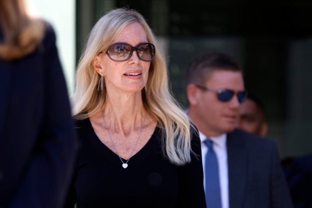 Beth Holloway walks out to speak to reporters after Joran van der Sloot's appearance in the Hugo L. Black Federal Courthouse, Oct. 18, 2023, in Birmingham, Ala