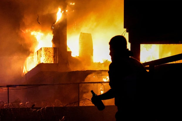 Protesters clash with Lebanese security forces outside the U.S. Embassy during a demonstration in solidarity with the people of Gaza on Oct. 18, 2023, in Awkar, Lebanon, east of Beirut.