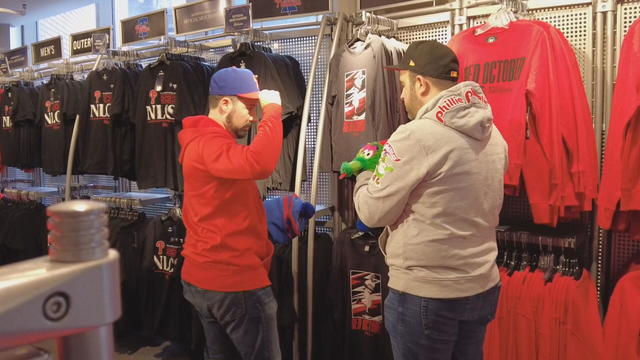 Philadelphia Phillies fans shop for merchandise at the team store