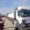 Truckloads of humanitarian aid finally enter Gaza