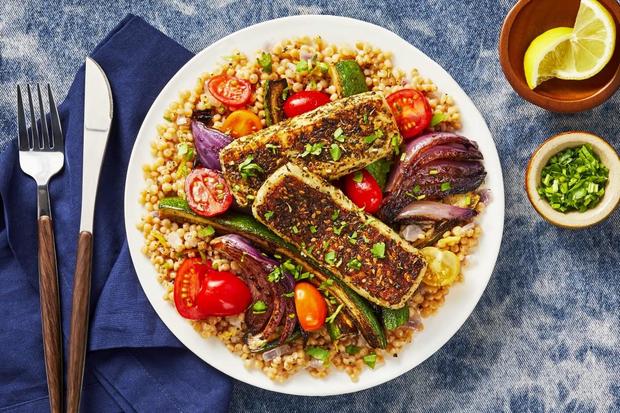 Za'atar-Crusted Grilling Cheese with Sumac-Spiced Zucchini & Onion over Couscous 