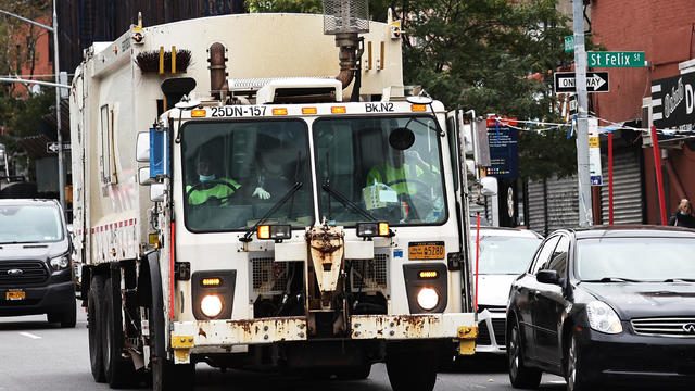 An NYC Sanitation truck is seen on October 29, 2021 in Downtown Brooklyn in New York City. 