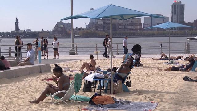 Sunbathers at Gansevoort Peninsula, Manhattan's first public beach 