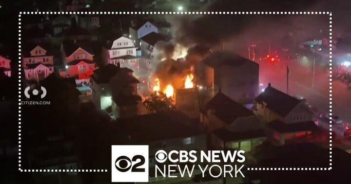 2 firefighters injured battling house fire in Queens - CBS New York