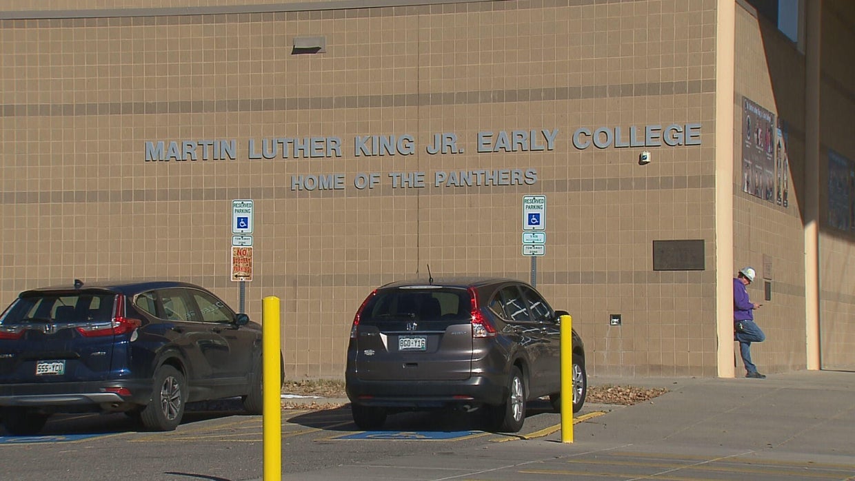 Dozens of Martin Luther King Jr. Early College students walk out of