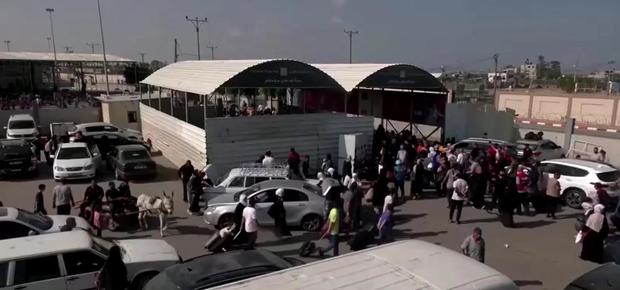 First Foreigners Leave Gaza Through The Rafah Border Crossing Into Egypt 