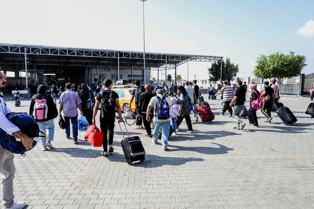 Palestinians waiting to cross the Rafah Border Gate 