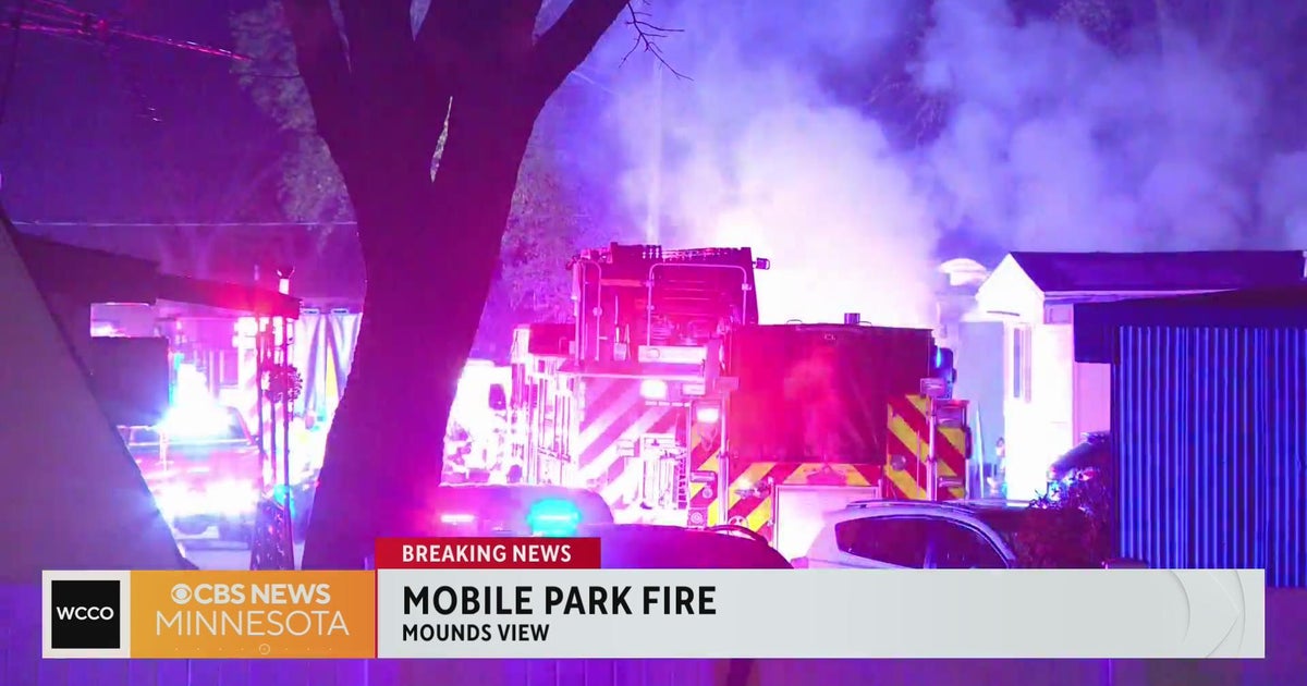 Watch: Crews battle fire at mobile home park in Mounds View - CBS Minnesota