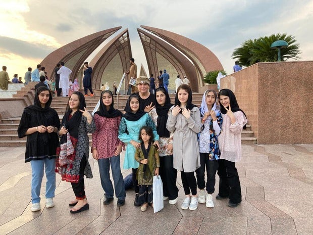 Lanny Cordola with a group of Afghan girls he helped in Pakistan