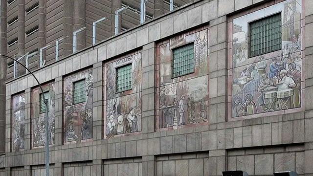 Murals painted on the exterior walls of the Manhattan Detention Center in Chinatown 