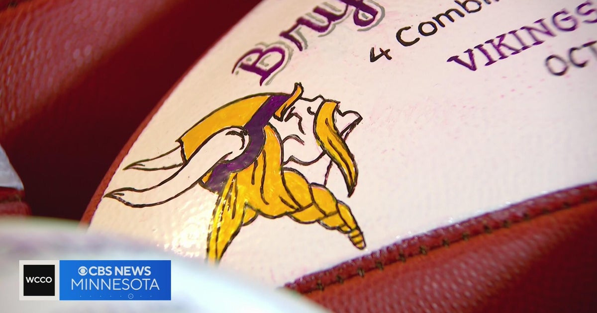 Dennis Foy has painted commemorative Vikings game footballs for 40
