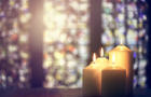 Candles in a church background 