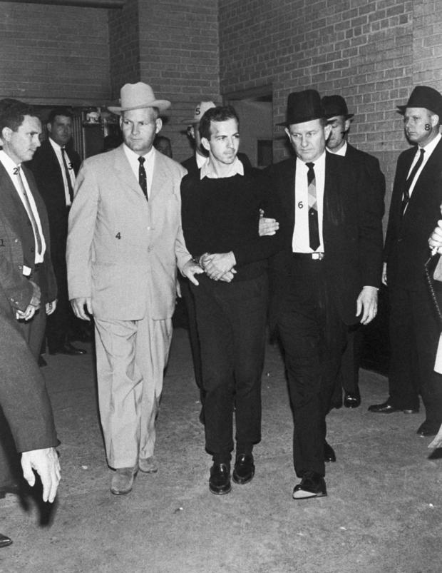 Guards Escorting Oswald After His Arrest 