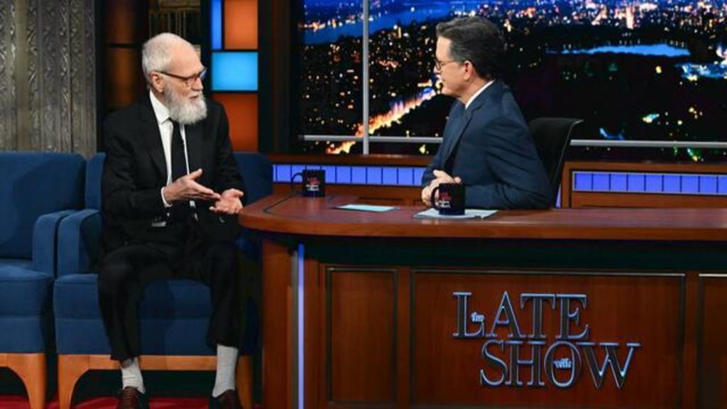 David Letterman returns to "The Late Show" for first time since 2015
in "Colbert" appearance