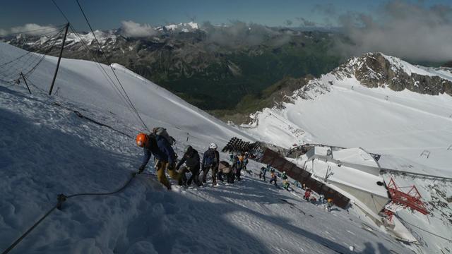 Ukrainian widows and children climbing in the Austrian Alps 