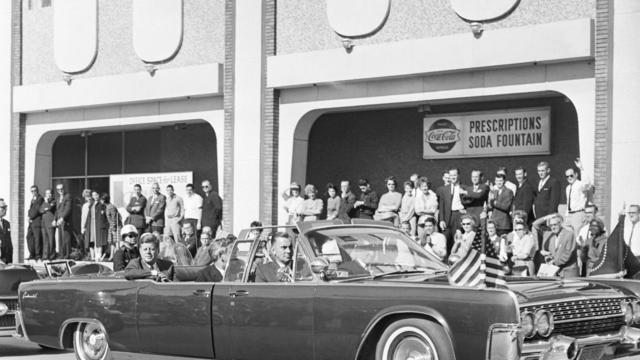 President Kennedy Riding in Convertible in Dallas 