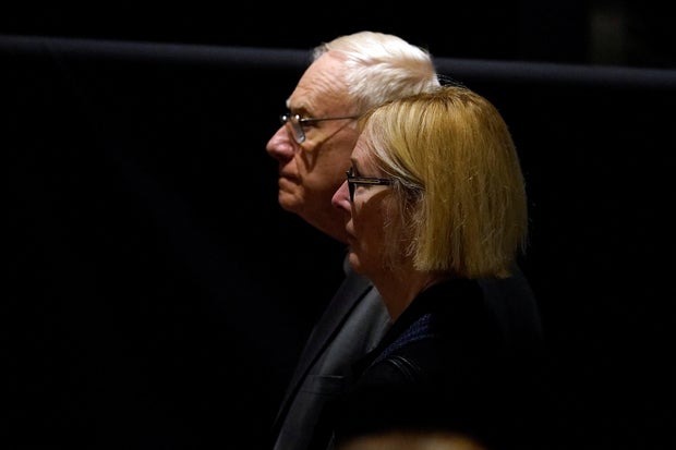 Kathy Cade, a longtime aide to former U.S. first lady Rosalynn Carter pauses at her casket at the Jimmy Carter Presidential Library and Museum in Atlanta